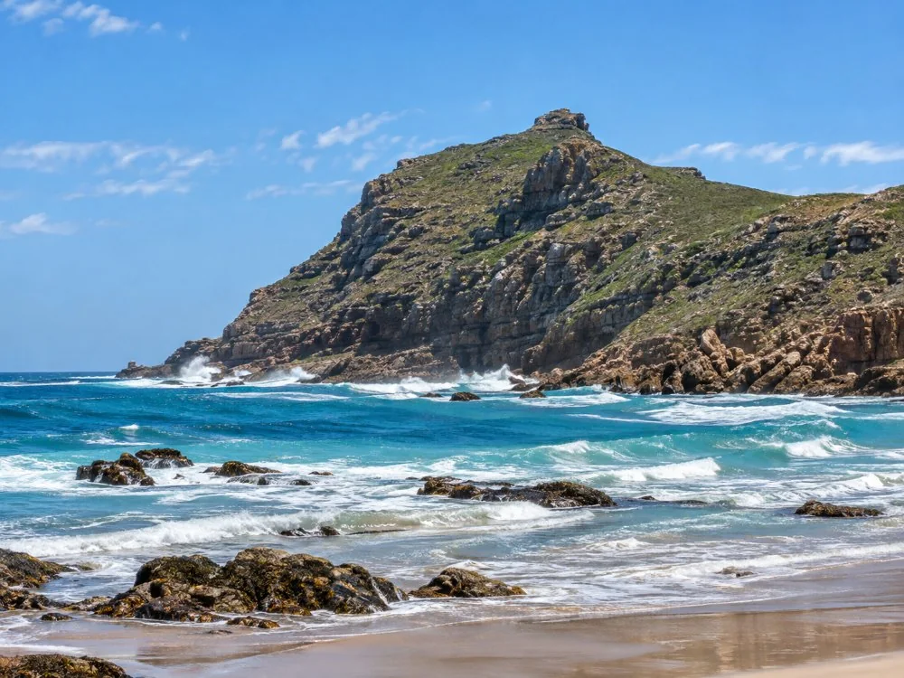 Waves breaking on the low rocky headland of the Cape of Good Hope