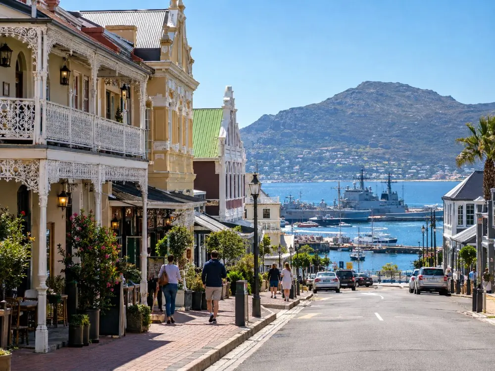 The historic main street of Simon's Town with the naval harbour behind